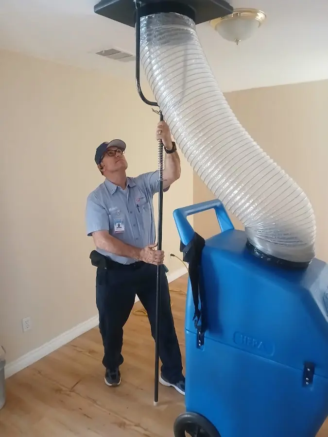 HVAC Installation technician using HEPA equipment in Park